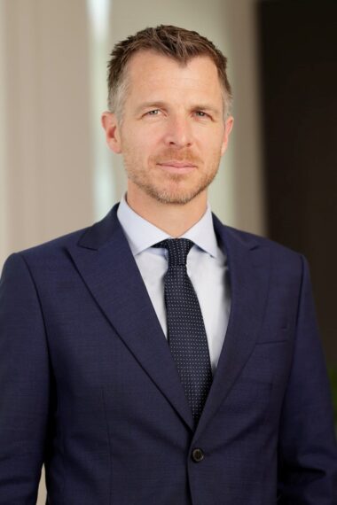 Corporate headshot of Chris Buckley